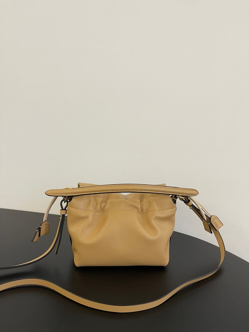 Fendi Mamma Baguette: The small apricot Mamma Baguette is a combination of a baguette and a lucky bag, arguably the most gentle bag online. The soft, supple lambskin is incredibly delicate, exuding both a relaxed and sophi