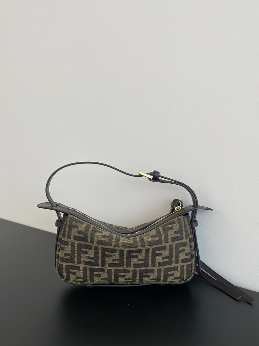 Fendi simply: The mini size, simply, is a runway style piece. Made from classic fabric paired with dark brown calfskin, it exudes a sophisticated, relaxed feel. The hand-stitched leather hardware is understated