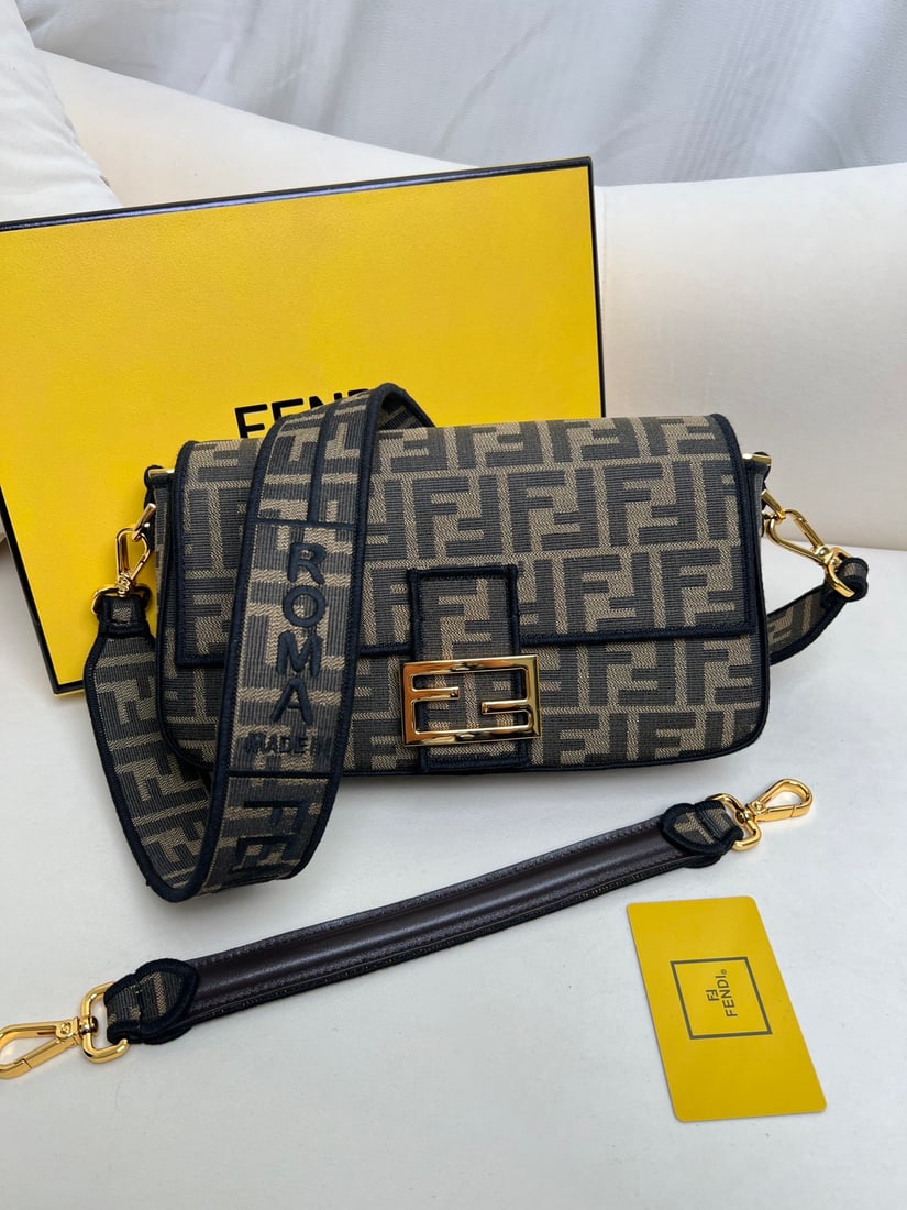 Fendi Baguette: Medium Baguette Handbag, Brown Fabric. The Iconic Baguette medium handbag is made of brown jacquard fabric with an FF pattern, featuring an FF clasp and black embroidered trim. It has a front flap, ma