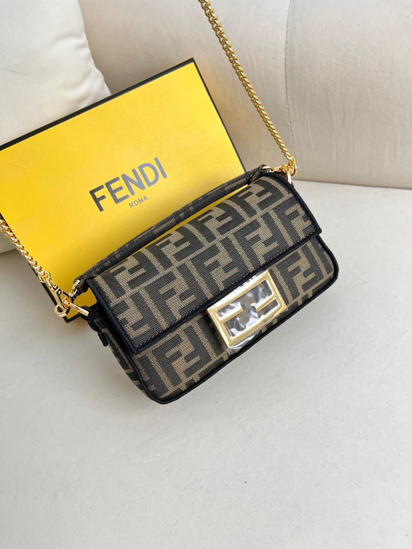 Fendi baguette: Mini Baguette Bag, Iconic Baguette, made of brown jacquard fabric with an FF pattern and FF clasp, accented with black embroidered trim. Features a front flap with magnetic closure, unlined interior