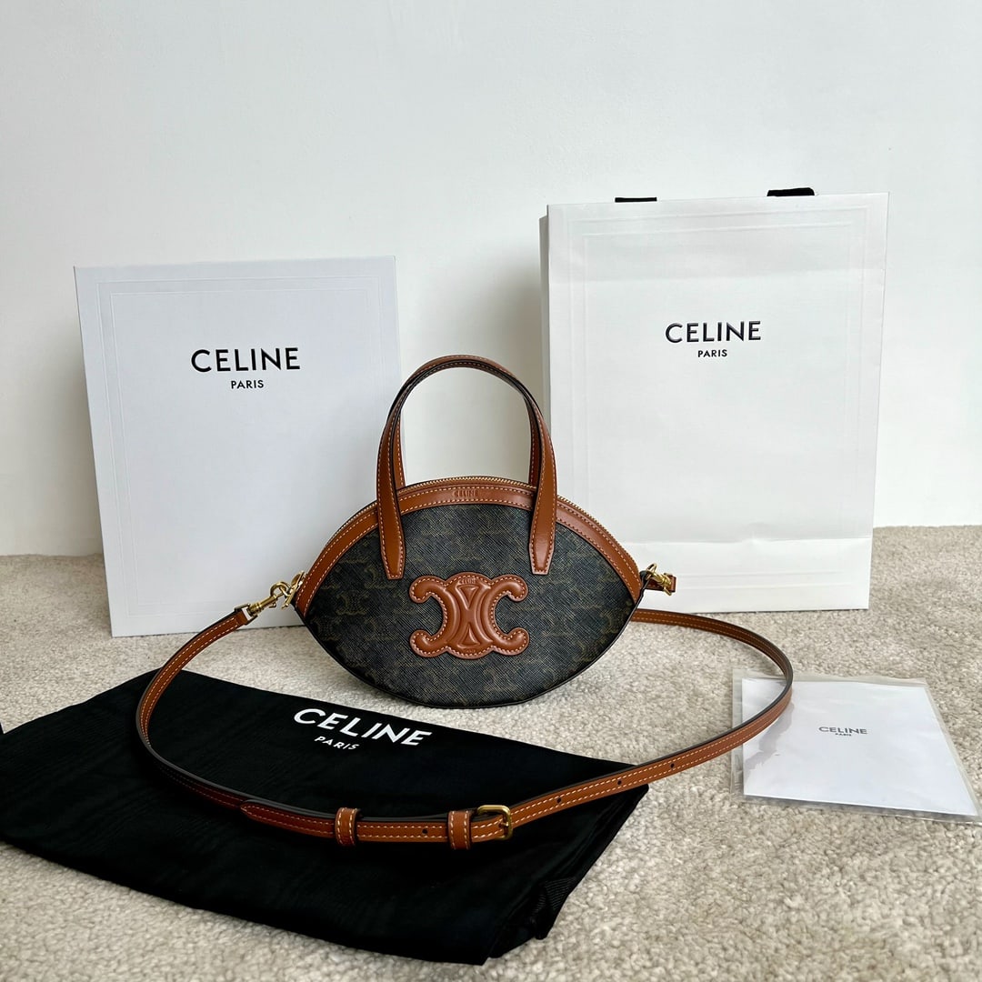 Celine: Dumpling bag, logo-print cowhide oval handbag, 21 x 24 x 5 cm. Logo print, cowhide trim, fabric lining, gold finish. Shoulder, crossbody, and hand carry. Zip closure. One main compartment with