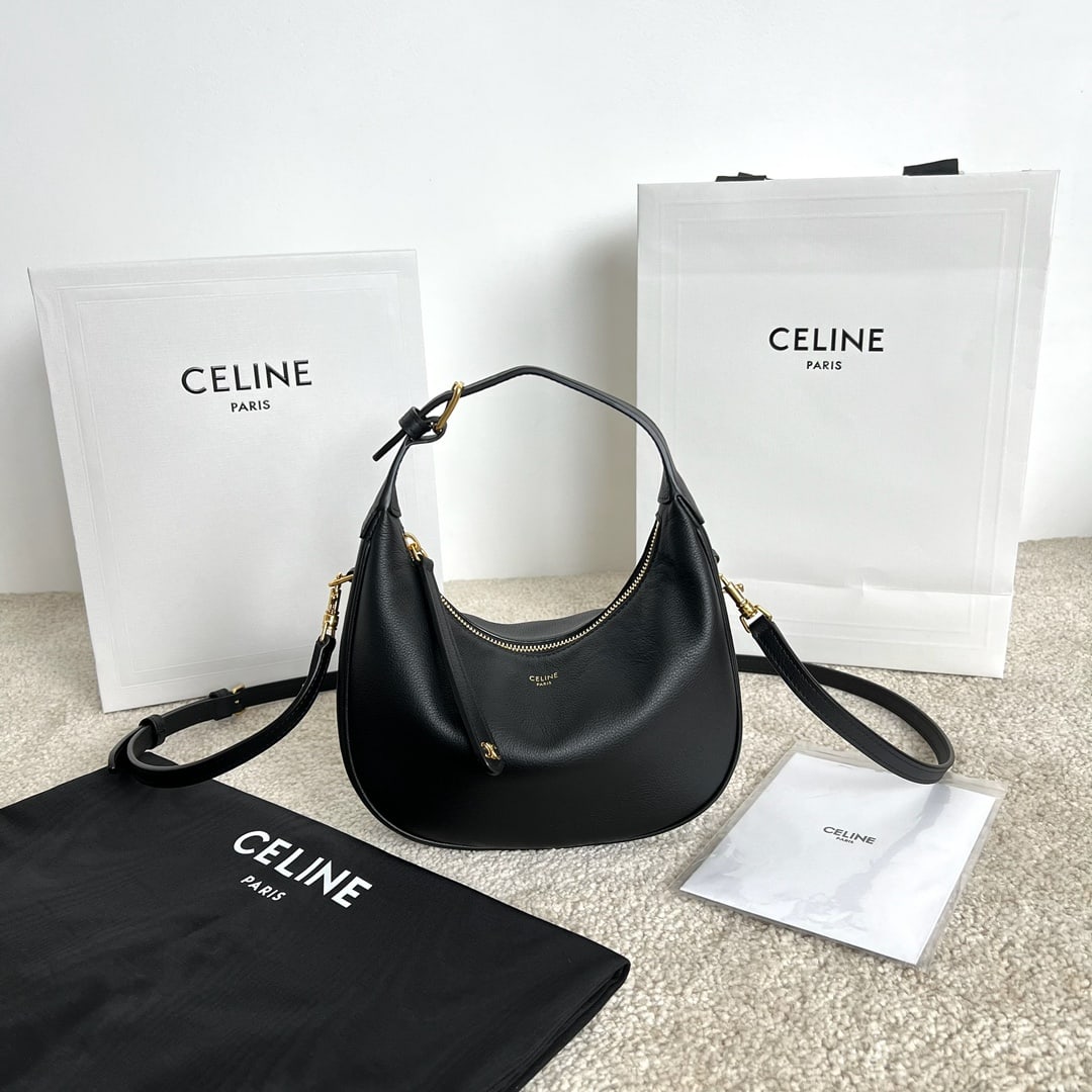 Celine TEEN LULU: This TEEN LULU soft grained cowhide leather handbag can be carried by hand, over the shoulder, or crossbody. It can fit a large smartphone (21 x 24 x 5 cm). Features include cowhide leather, suede lin