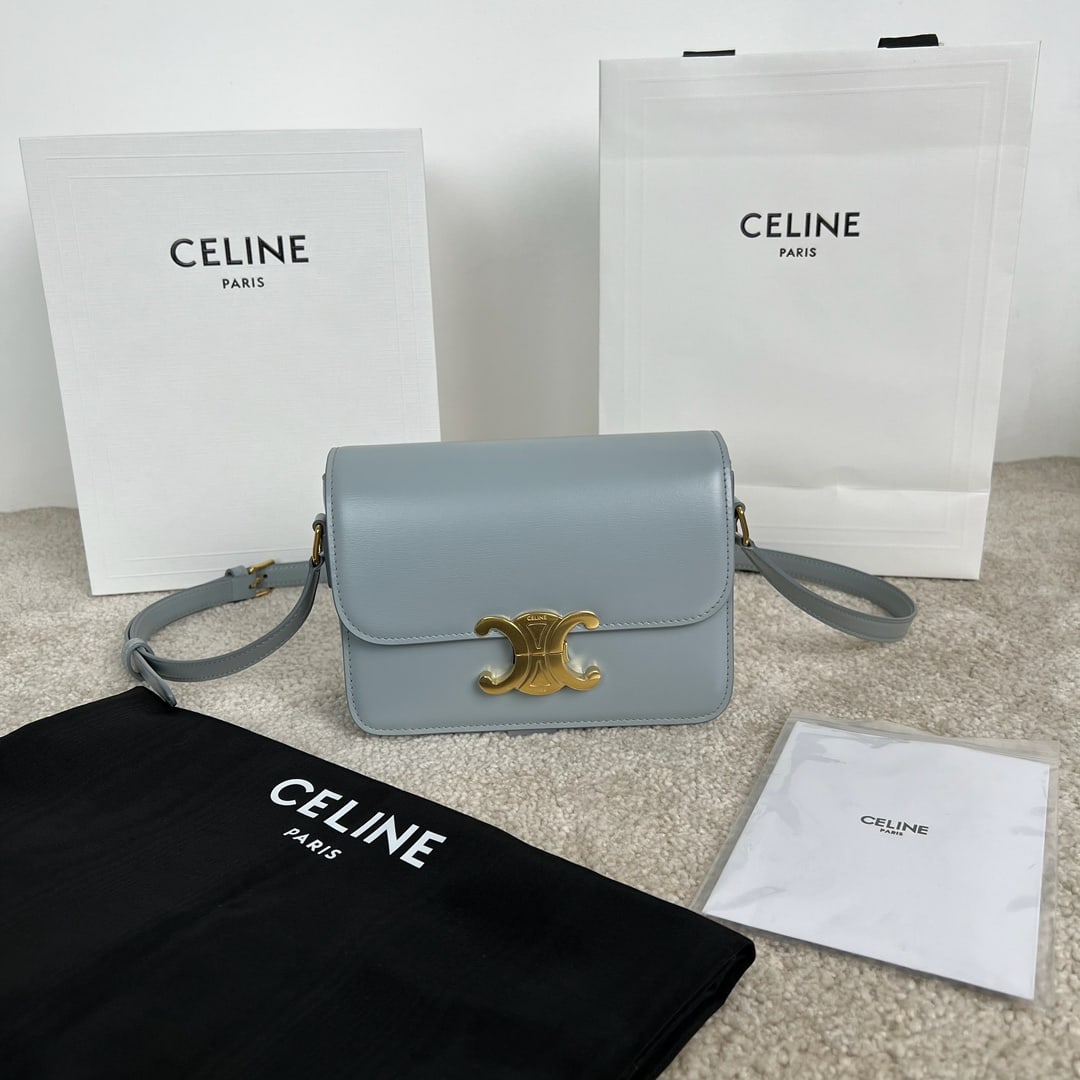 Celine Triophe: TRIOMPHE Ice Blue Small Glossy Calfskin Handbag 7 x 6 x 2 inches (18.5 x 14 x 6 cm) 100% Calfskin, 100% Lambskin Lining, Gold-tone Hardware. Crossbody and shoulder carry. TRIOMPHE features a clasp,