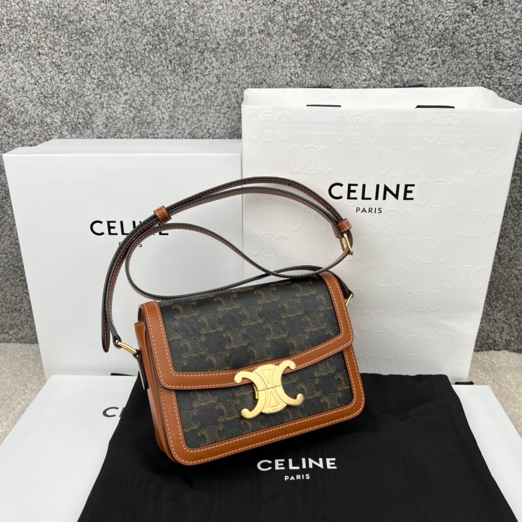 Celine Triophe: TRIOMPHE Small Canvas and Calfskin Handbag 7 x 6 x 2 inches (18.5 x 14 x 6 cm) 81% Calfskin, 19% Fabric 100% Lambskin Lining Gold-tone Hardware Crossbody and Shoulder Carry TRIOMPHE Metallic Lock