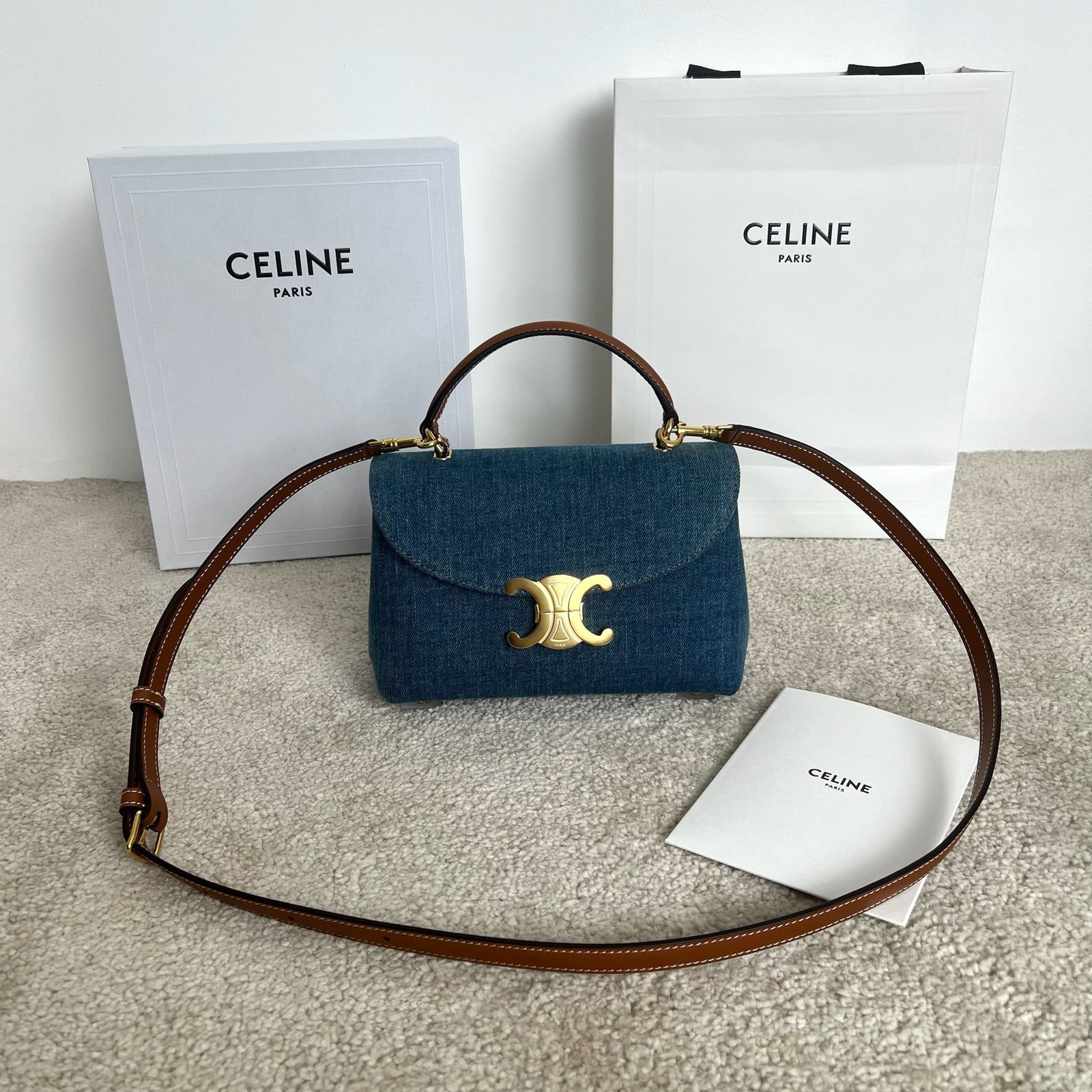 Celine TEEN NINO: TEEN NINO handbag, denim blue/tan, dimensions 20.5 x 13 x 8 cm, fabric, fabric lining, handle, shoulder, and crossbody carry, TRIOMPHE metal clasp, 2 main compartments, 2 interior flat pockets, 1 inte