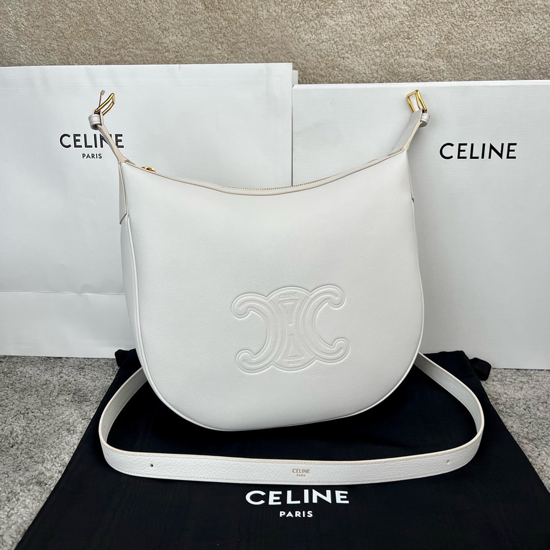 Celine Helois: HELOIS Soft Calfskin Leather Handbag, dimensions 30 x 28.5 x 8 cm, calfskin leather, suede lining, gold-tone finish, shoulder carry, zip closure, one main compartment, adjustable shoulder strap.