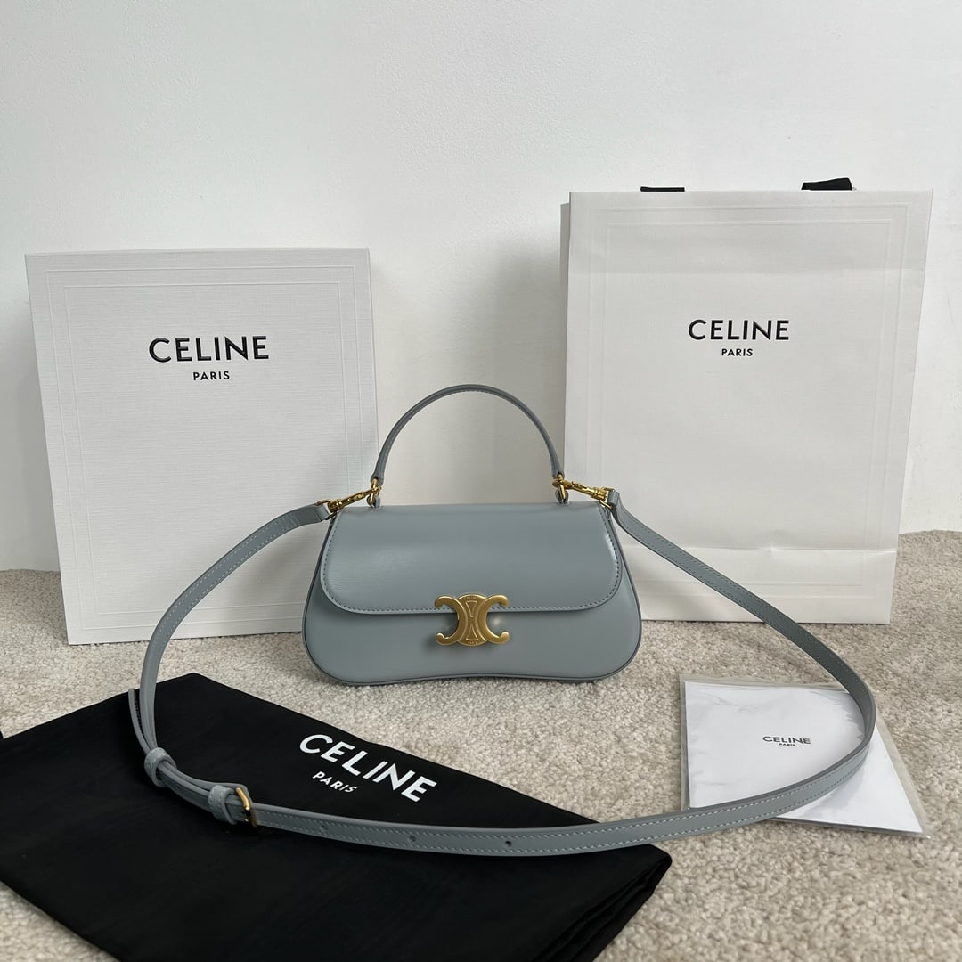 Celine LOLA: LOLA Mini Baguette Handbag, Ice Blue, Simple and Elegant. Continuing the slender baguette silhouette of the Triomphe shoulder bag, its highlight is the romantic curved bottom design, adding a touch of