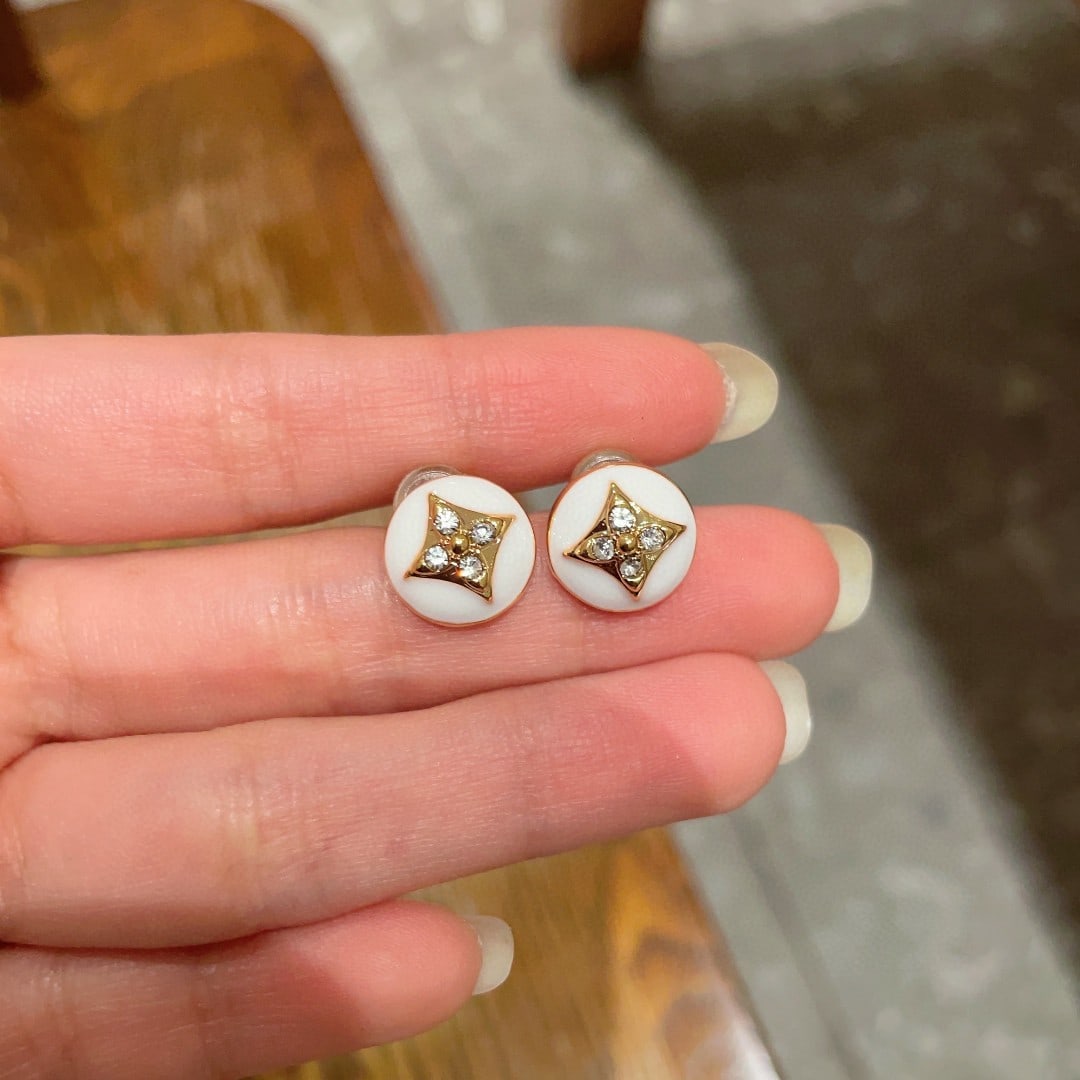 LV earrings: Louis Vuitton earrings: Unique materials and design, retro yet avant-garde. Thank you for viewing our auction and we look forward to serving you as a valued Gold Standard Auctions customer! Each item 