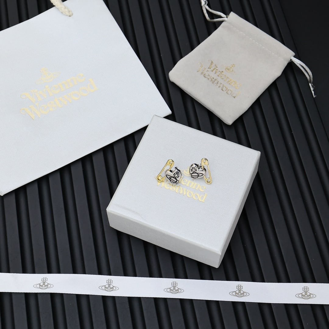 Vivienne Westwood: Trendy Vivienne Westwood Saturn two-tone safety pin earrings - a must-have for women. Jewelry is the key to an overall look; fashion icon. Thank you for viewing our auction and we look forward to