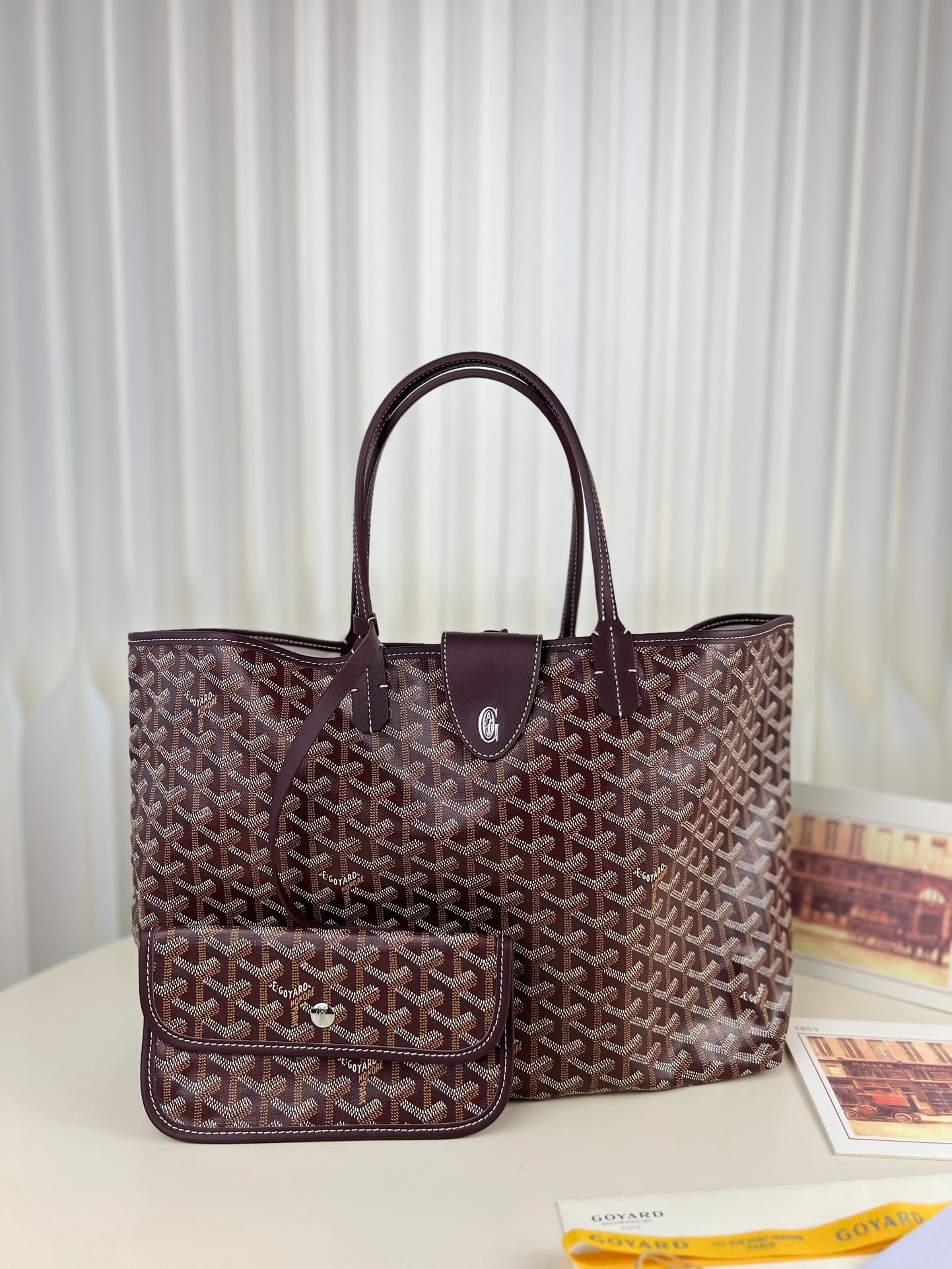 Goyard Saint Louis Tote: The Goyard Saint Louis Tote is made of calfskin canvas, which feels firm yet soft to the touch. It can be folded up for storage, making it a true shopping bag. It's not only suitable for everyday use 