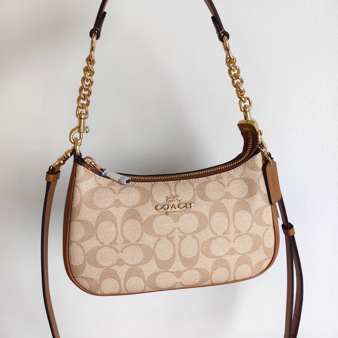COACH TERI: COACH CA548 Classic Logo TERI Shoulder Bag, PVC with Leather Trim, Shoulder/Crossbody/Underarm Bag. Dimensions: 24.5cm (Length) x 15.5cm (Height) x 7.5cm (Width). Thank you for viewing our auction