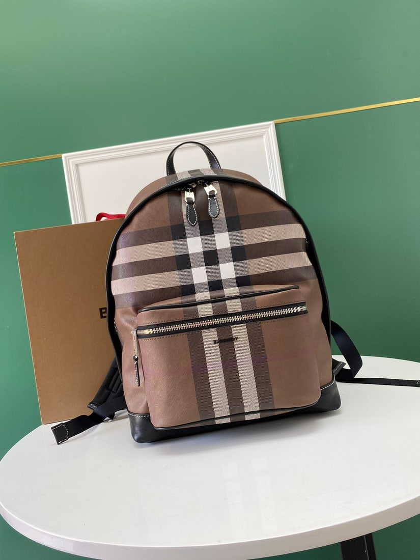 Burberry: The Burberry birchwood check backpack has been refreshed and is now made from eco-friendly check canvas. This canvas is primarily made from renewable resources, requiring less water and producing less