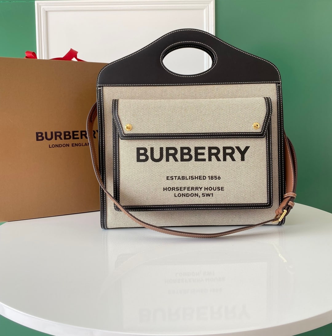 Burberry pocket bag: Burberry's limited-edition pocket bag is absolutely gorgeous this season! The combination of leather and canvas, along with the caramel coffee and cream white color scheme, creates a retro, sophistica
