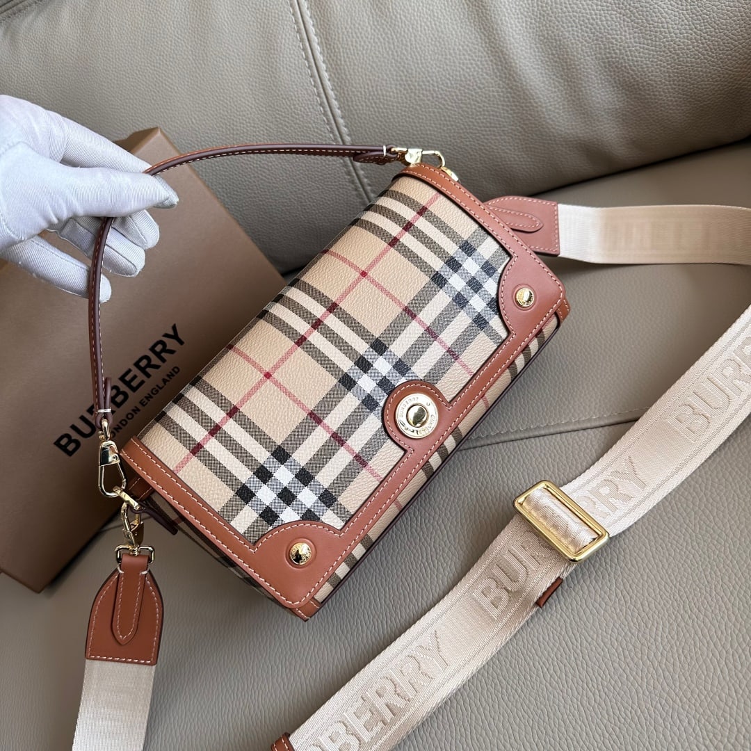 Burberry vintage check mini bag: This Burberry vintage check mini bag is absolutely stunning! The unique combination of the handles and wide shoulder strap is inspired by the brand's archival collection. It's adorned with Burberry's 
