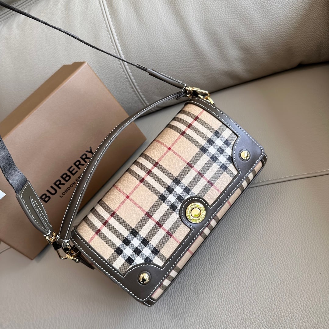 Burberry vintage check mini bag: This Burberry vintage check mini bag is absolutely stunning! The unique combination of the handles and wide shoulder strap is inspired by the brand's archival collection. It's adorned with Burberry's