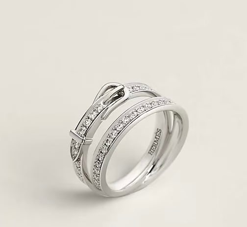 Hermes: Popular Hermes belt buckle rings with micro-pave setting and eight-heart and eight-arrow facets. Thank you for viewing our auction and we look forward to serving you as a valued Gold Standard