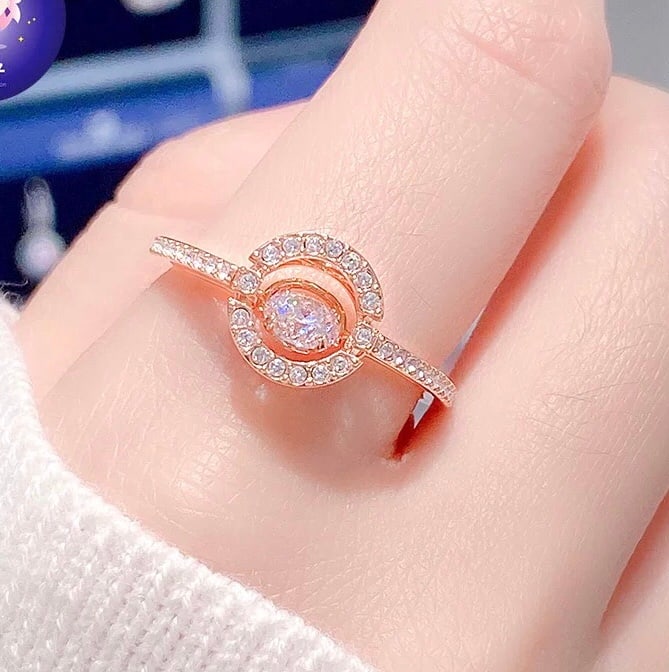 Swarovski: Swarovski rose gold beating heart ring, silver-blue Thank you for viewing our auction and we look forward to serving you as a valued Gold Standard Auctions customer! Each item has been carefully