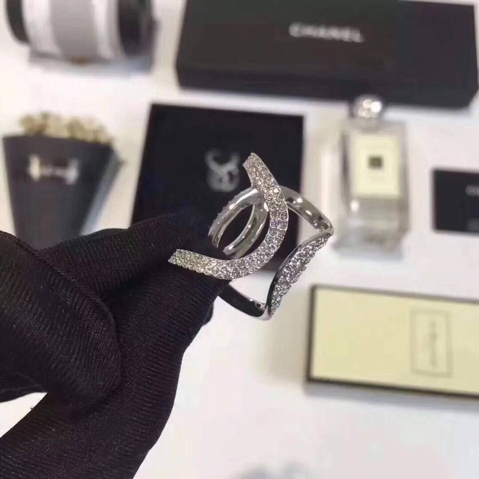 CHANEL: The CHANEL ring with its open design is truly an essential versatile item for winter. It's bold, stylish, and timeless, instantly eye-catching. The Swarovski crystal adds a fashionable, classic, and v