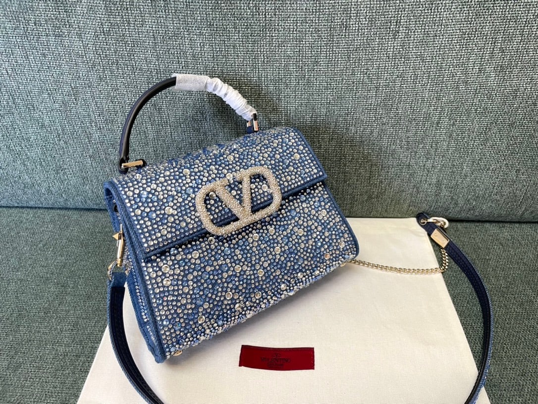 Valentino Romanstud: Star Diamond Collection? Valentino Romanstud Denim Denim with Diamond Embellished Design Thank you for viewing our auction and we look forward to serving you as a valued Gold Standard Auctions custome