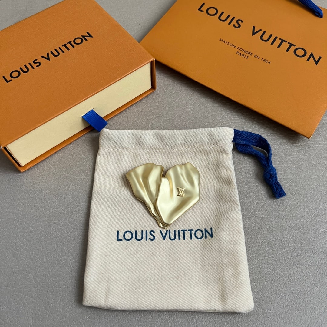 LV brooch: Wear an LV brooch with confidence and become the center of attention. Thank you for viewing our auction and we look forward to serving you as a valued Gold Standard Auctions customer! Each item has