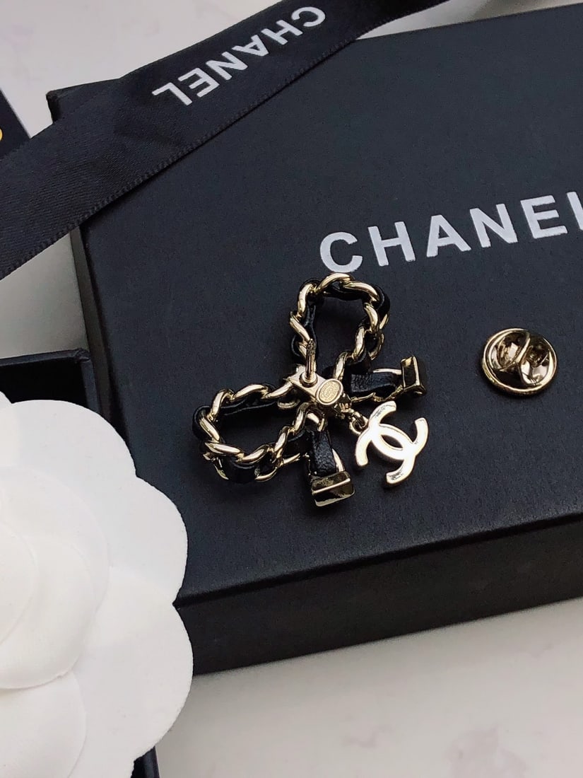 CHANEL Brooch: CHANEL Brooch Thank you for viewing our auction and we look forward to serving you as a valued Gold Standard Auctions customer! Each item has been carefully selected to bring quality, character, and o