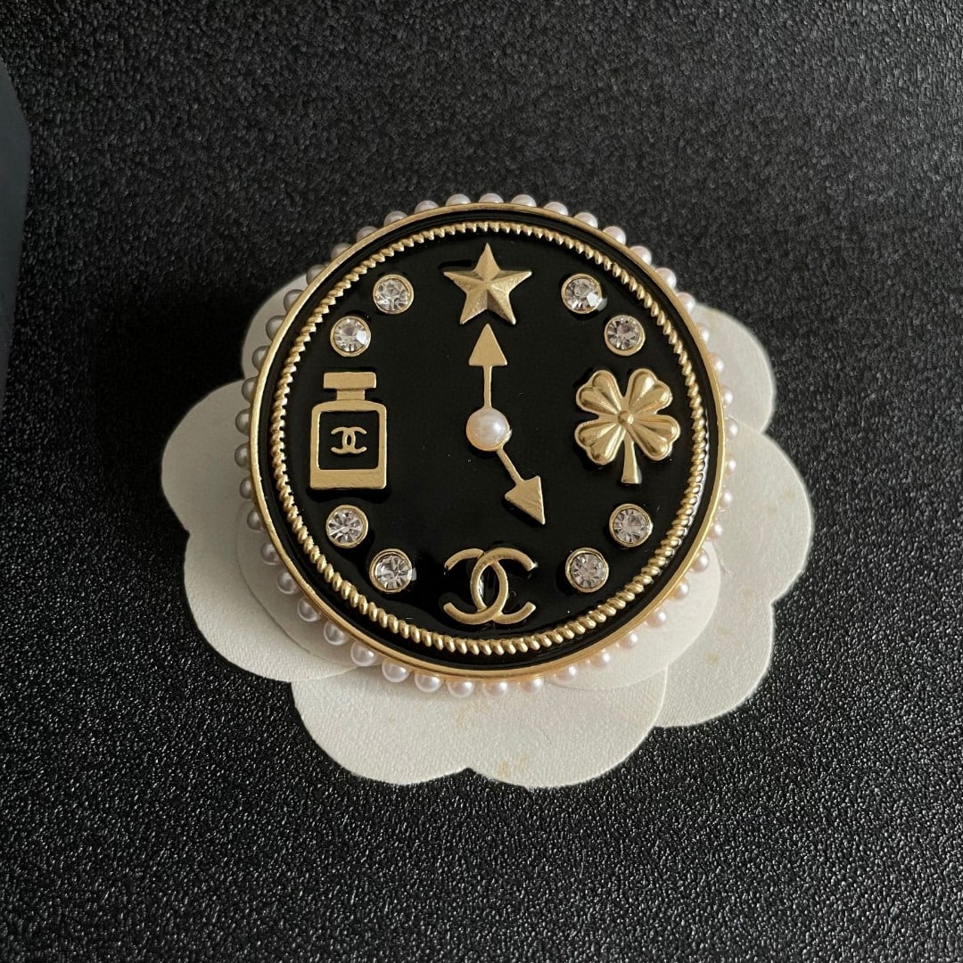 CHANEL Double C Brooch: CHANEL Double C Brooch Thank you for viewing our auction and we look forward to serving you as a valued Gold Standard Auctions customer! Each item has been carefully selected to bring quality,