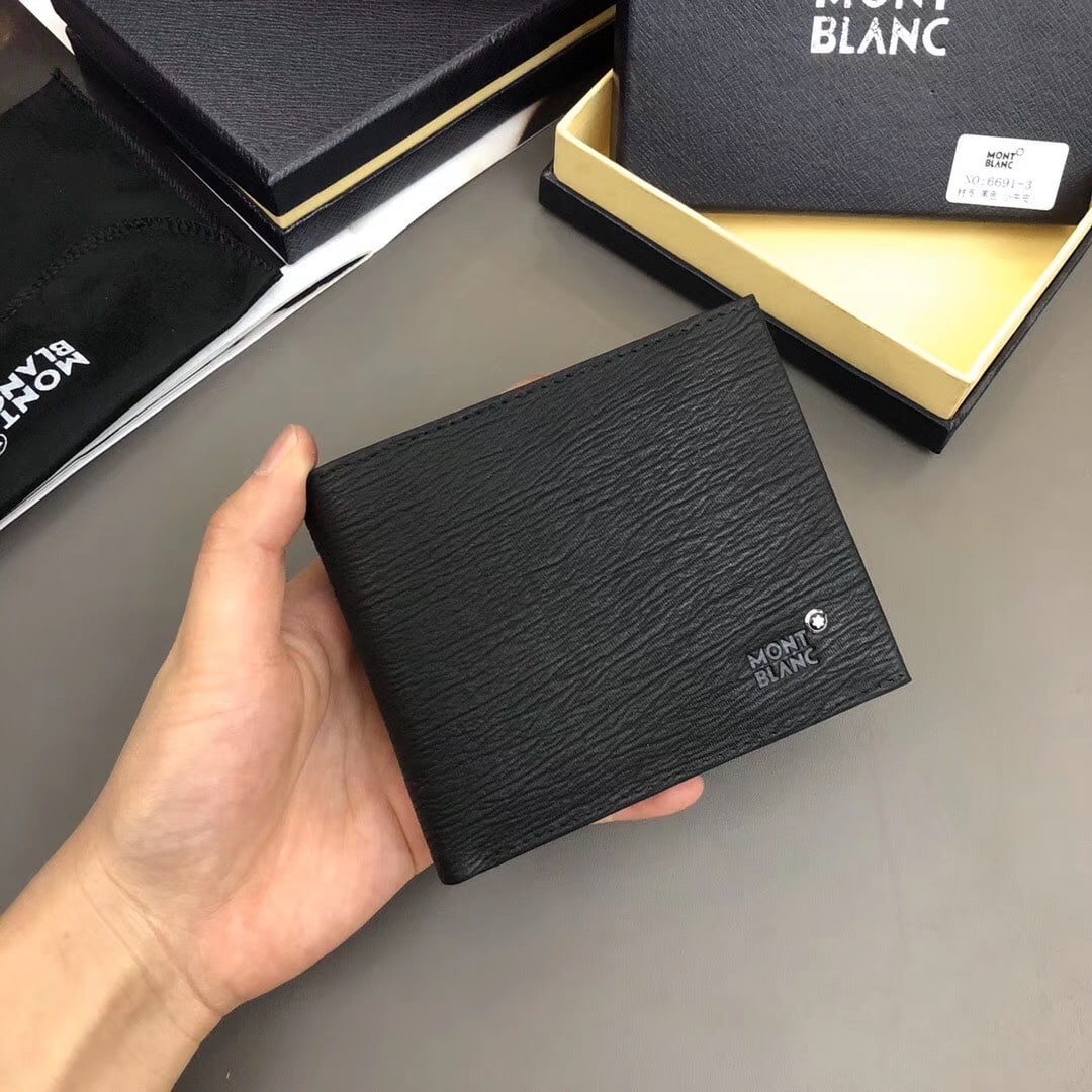 MONTBLANC wallet: Color: Black; Size: 12x10 cm; Men's soft leather short style, bi-fold, superb cowhide feel. Thank you for viewing our auction and we look forward to serving you as a valued Gold Standard Auctions cust
