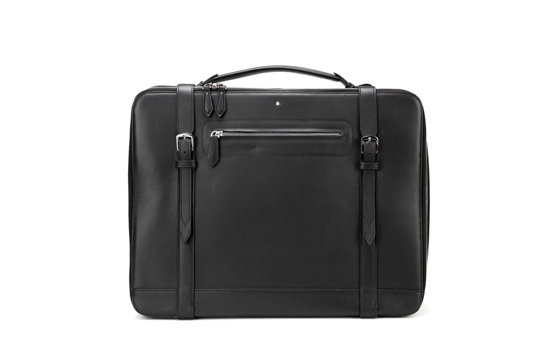 MONTBLANC Meisterstuck Leather Suitcase: The MONTBLANC Meisterstuck Soft Leather Suitcase boasts a bold, retro design and supple leather texture, making it a stylish addition to any travel outfit. This bag can hold many essentials, revealing