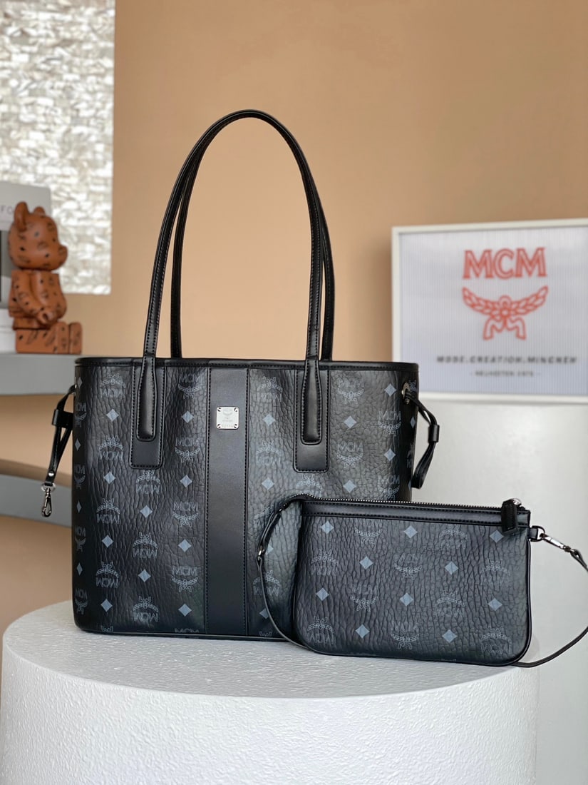 MCM LIZ VISETOS MINI Small Reversible Shopping Bag Mother Bag: MCM LIZ VISETOS MINI Small Reversible Shopping Bag (Mother Bag) - Classic Black. This is a signature two-in-one item. The petite Liz bag features a double-sided Cubic cotton canvas design, showcasing