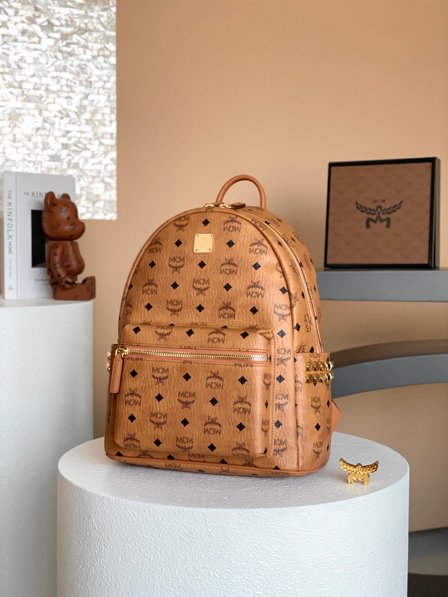 MCM STARK VISETOS Small Studded Backpack: MCM STARK VISETOS Small Studded Backpack, Cognac Color, All-over Visetos Coating, #Unisex Bag# The ceiling inside the backpack. This well-structured backpack features luxurious Nappa leather trim,