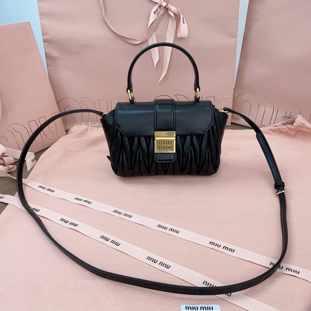 MIUMIU: MIUMIU 17 X 12.5 X 7CM Thank you for viewing our auction and we look forward to serving you as a valued Gold Standard Auctions customer! Each item has been carefully selected to bring quality, charact