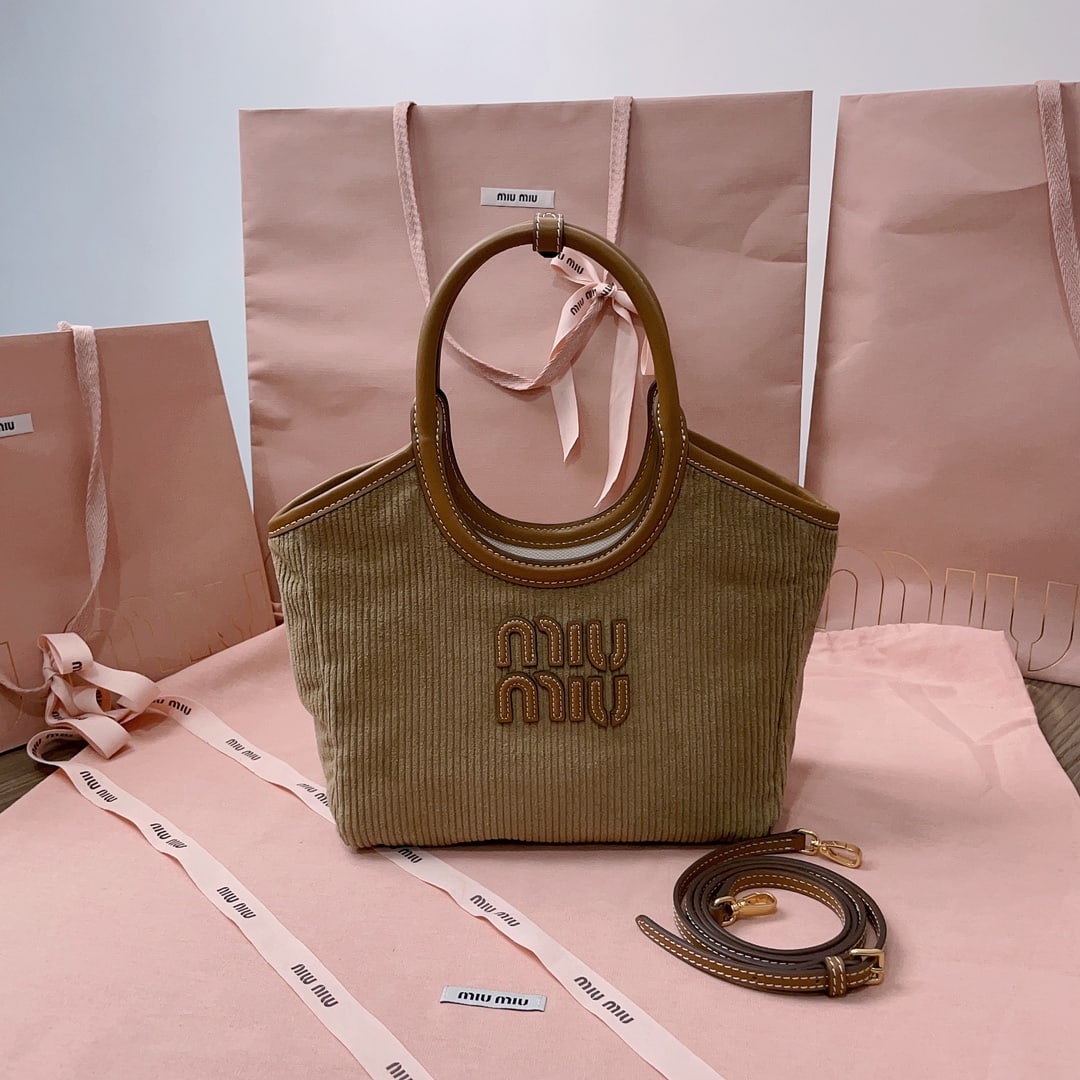 MIUMIU: MIUMIU 22 X 14 X 11CM Thank you for viewing our auction and we look forward to serving you as a valued Gold Standard Auctions customer! Each item has been carefully selected to bring quality, characte