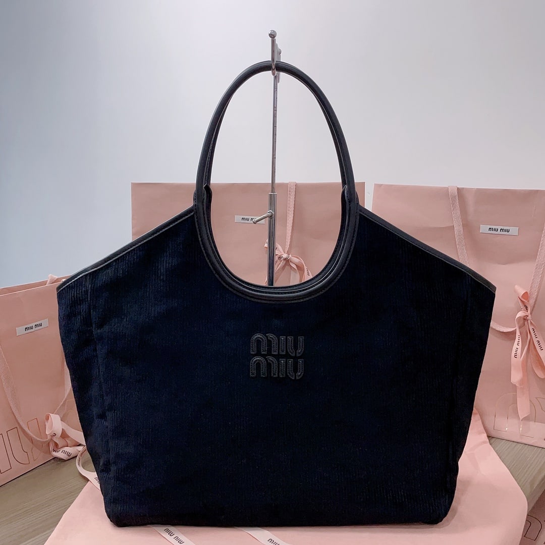 MIUMIU: MIUMIU 38 X 38 X 18CM Thank you for viewing our auction and we look forward to serving you as a valued Gold Standard Auctions customer! Each item has been carefully selected to bring quality, characte