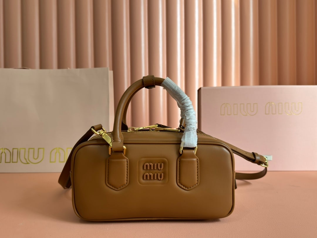 MIUMIU: MIUMIU 22 X 10.5 X 7.5CM Thank you for viewing our auction and we look forward to serving you as a valued Gold Standard Auctions customer! Each item has been carefully selected to bring quality, chara