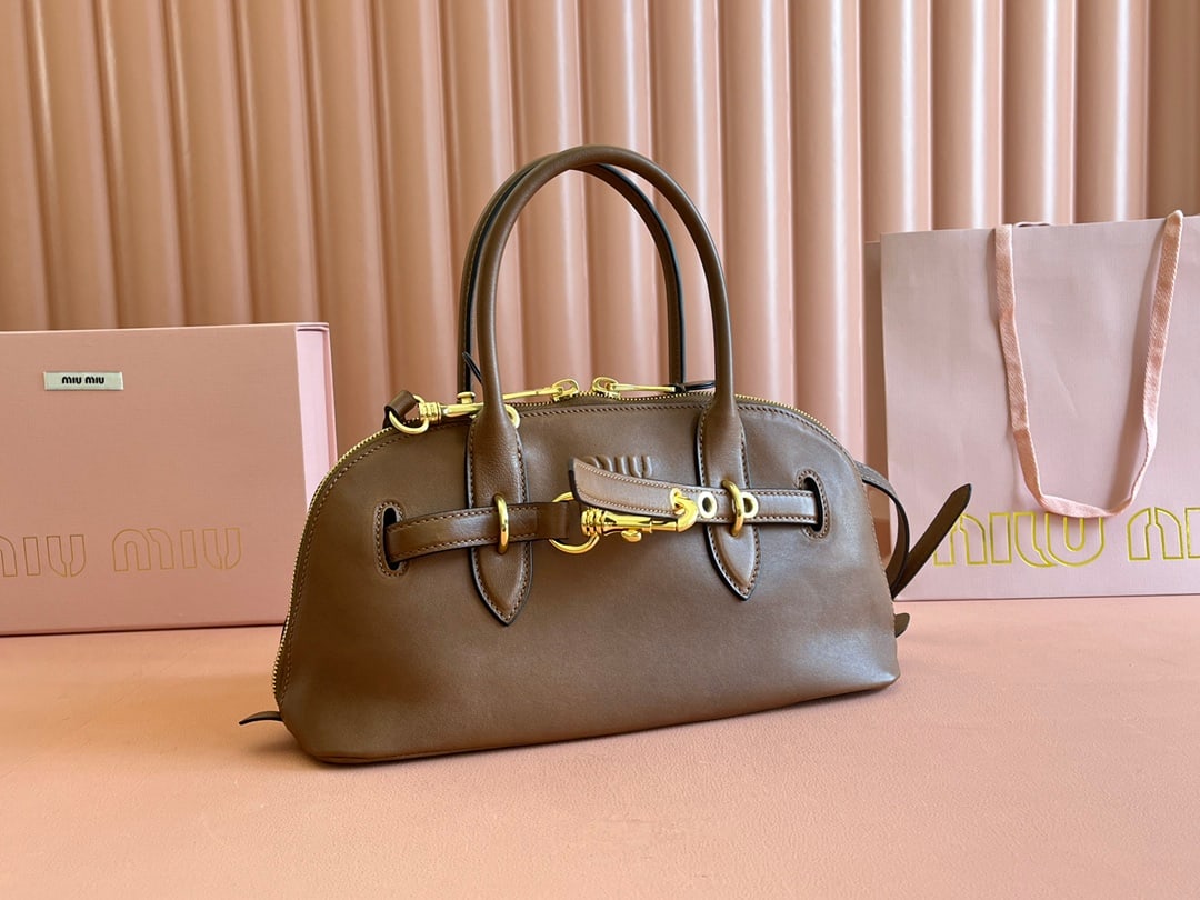 MIUMIU: MIUMIU 33 X 16.5 X 10CM Thank you for viewing our auction and we look forward to serving you as a valued Gold Standard Auctions customer! Each item has been carefully selected to bring quality, charac