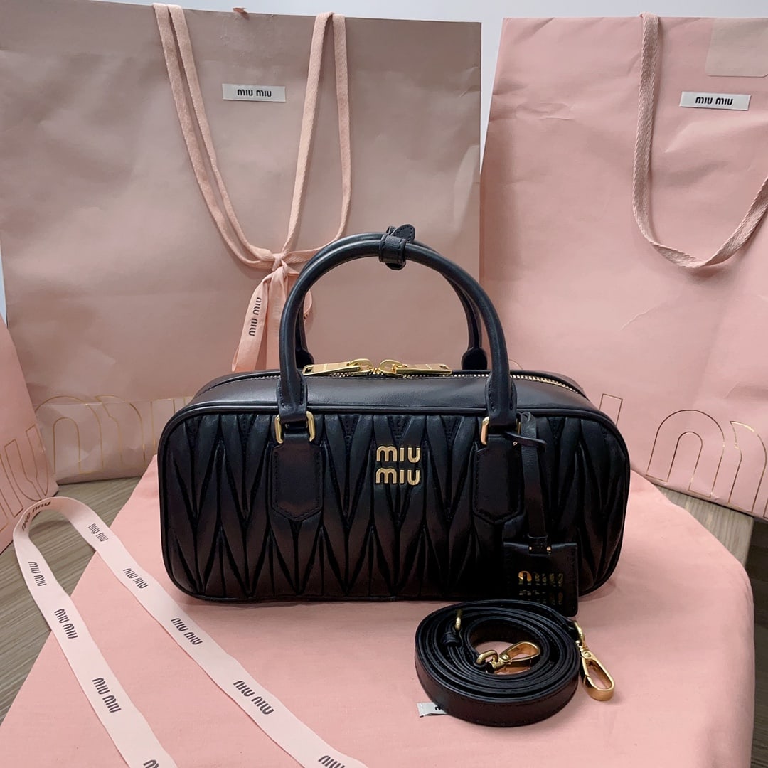 MIUMIU: MIUMIU 27 X 12 X 9CM Thank you for viewing our auction and we look forward to serving you as a valued Gold Standard Auctions customer! Each item has been carefully selected to bring quality, character
