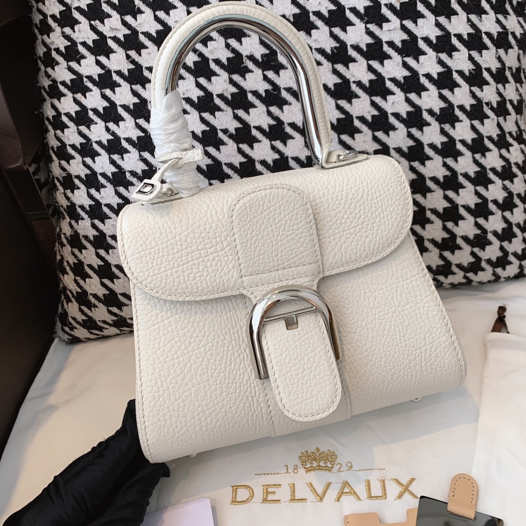 Delvaux Brillant Mini Metal Glam: The Brillant Mini Metal Glam bag is crafted from rugged calfskin with a textured neckline and features premium stainless steel hardware. The metal wrist strap design is charming yet understated,