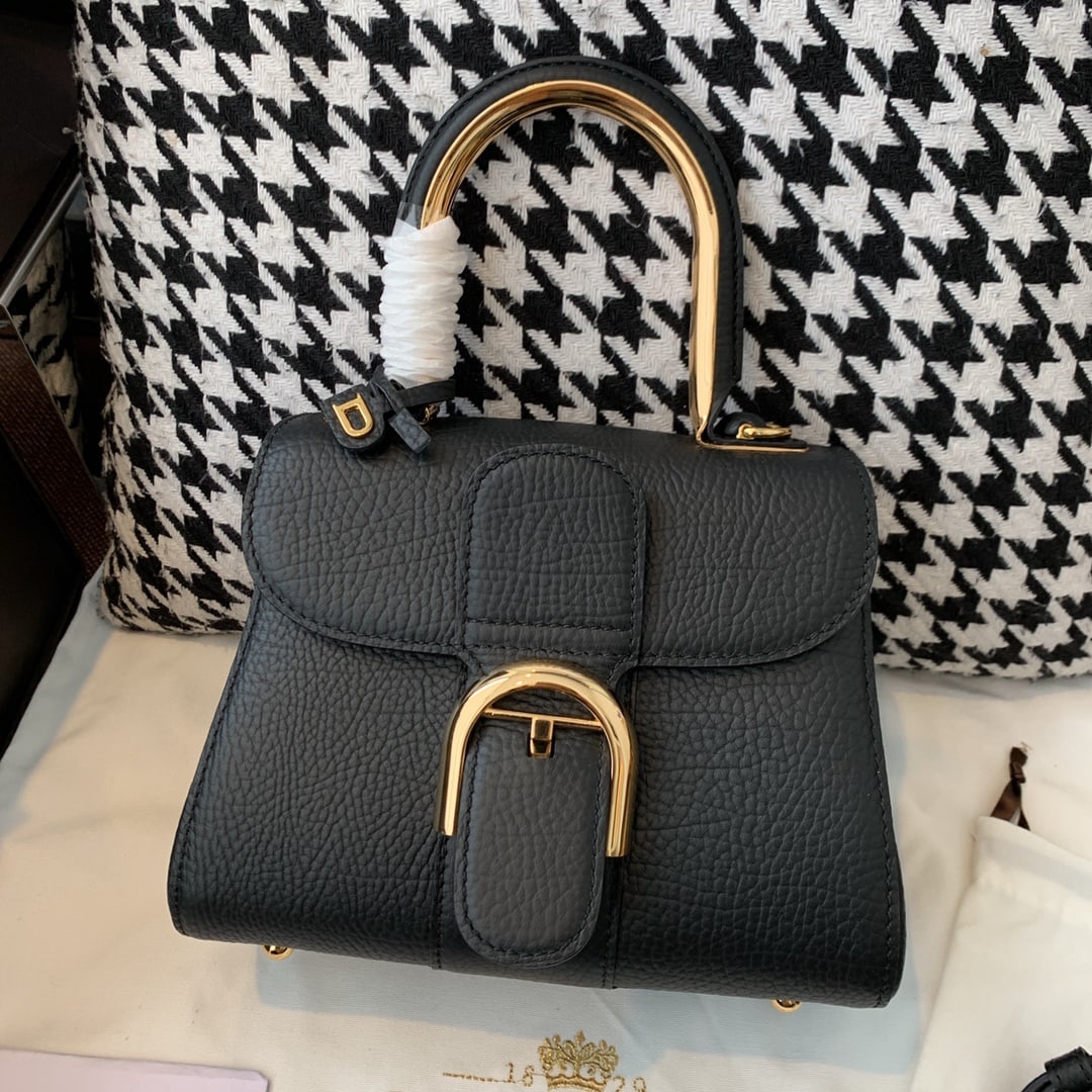 Delvaux Brillant Mini Metal Glam: The Brillant Mini Metal Glam bag is crafted from rugged calfskin with a textured neckline and features premium stainless steel hardware. The metal wrist strap design is charming yet understated,