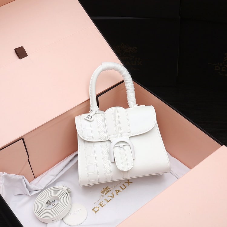 Delvaux BL: Belgian Delvaux BL series white box leather bag with white lizard, crocodile, and snake prints- a legend spanning two centuries! Full of vintage charm, it features a detachable strap for easy crossbod