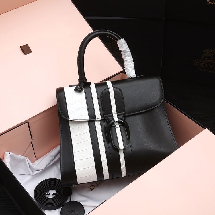 Delvaux BL: A legendary bag from the Belgian Delvaux BL series, made of black box leather with white lizard, crocodile, and snake prints, spanning two centuries! Full of vintage charm, it features a detachable st