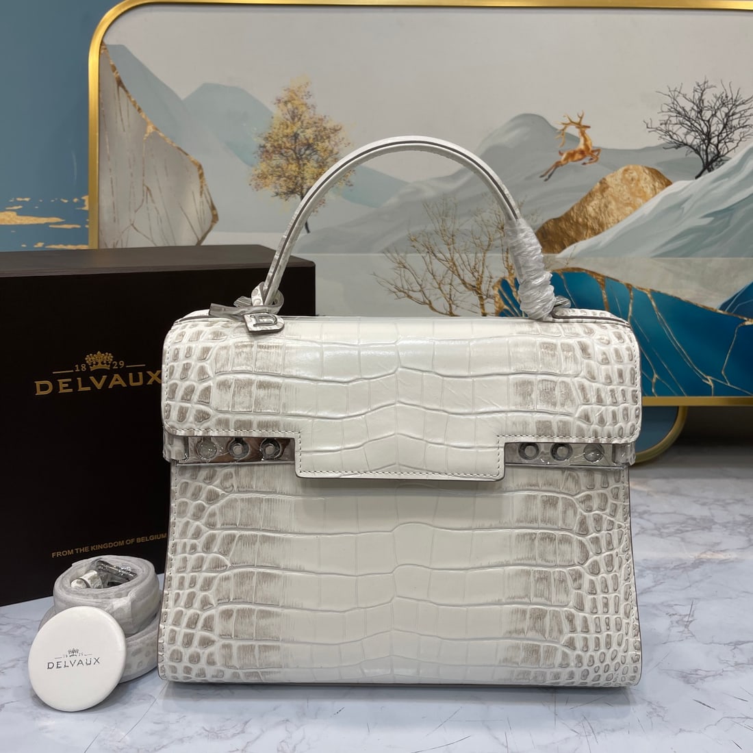 Delvaux Alligator Ceremica: The timeless beauty of the Himalayas: Delvaux, a Belgian royal warrant holder, presents the stunning Himalayan Tempete bag, the "Alligator Ceremica," every woman's ultimate dream bag! Crafted from Nil