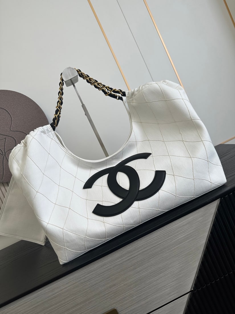 CHANEL Blue Double C Canvas Beach Bag/Tote Bag: CHANEL blue double-C canvas tote bag, featuring clean canvas material and a blue tone, perfect for everyday commuting! Dimensions: 20/43/17cm Thank you for viewing our auction and we look forward to s