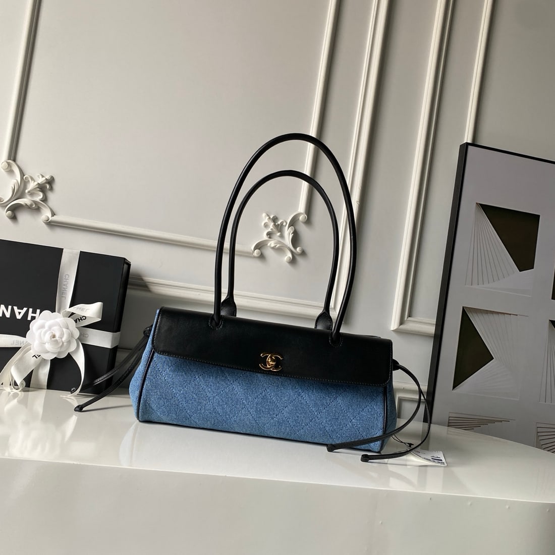 CHANEL baguette shoulder bag: The denim CHANEL baguette shoulder bag, launched by Matthieu Blazy after he took over as CEO, is a popular style and one of the most frequently sold-out bags in recent years. Made of durable and