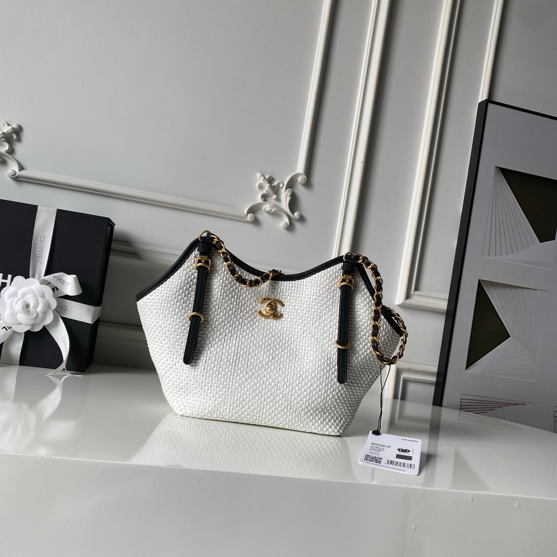 CHANEL Cruise Collection (Spring Cruise Collection): CHANEL Cruise Collection Limited Edition Raffia Straw Woven Calfskin with Gold Metallic accents. The high-density cross-weave is breathable and lightweight, ensuring comfort and comfort even in