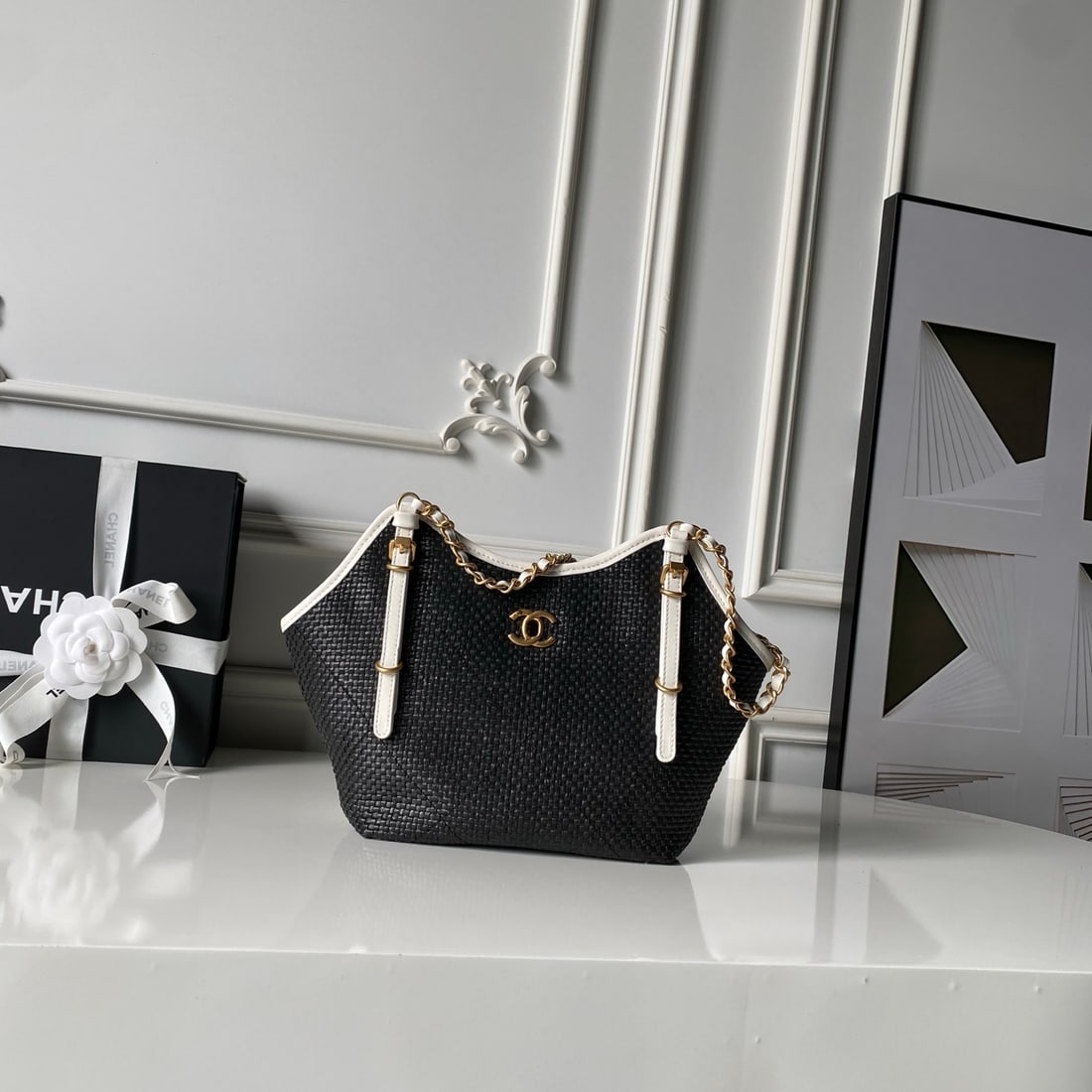 CHANEL Cruise Collection (Spring Cruise Collection): CHANEL Cruise Collection Limited Edition Raffia Straw Woven Calfskin with Gold Metallic accents. The high-density cross-weave is breathable and lightweight, ensuring comfort and comfort even in