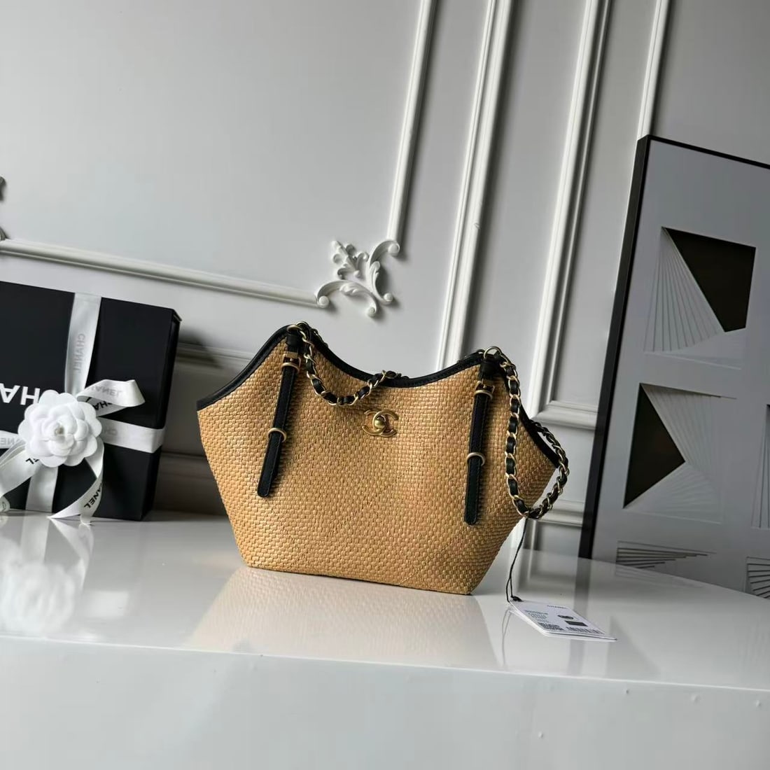 CHANEL Cruise Collection (Spring Cruise Collection): CHANEL Cruise Collection Limited Edition Raffia Straw Woven Calfskin with Gold Metallic accents. The high-density cross-weave is breathable and lightweight, ensuring comfort and comfort even in