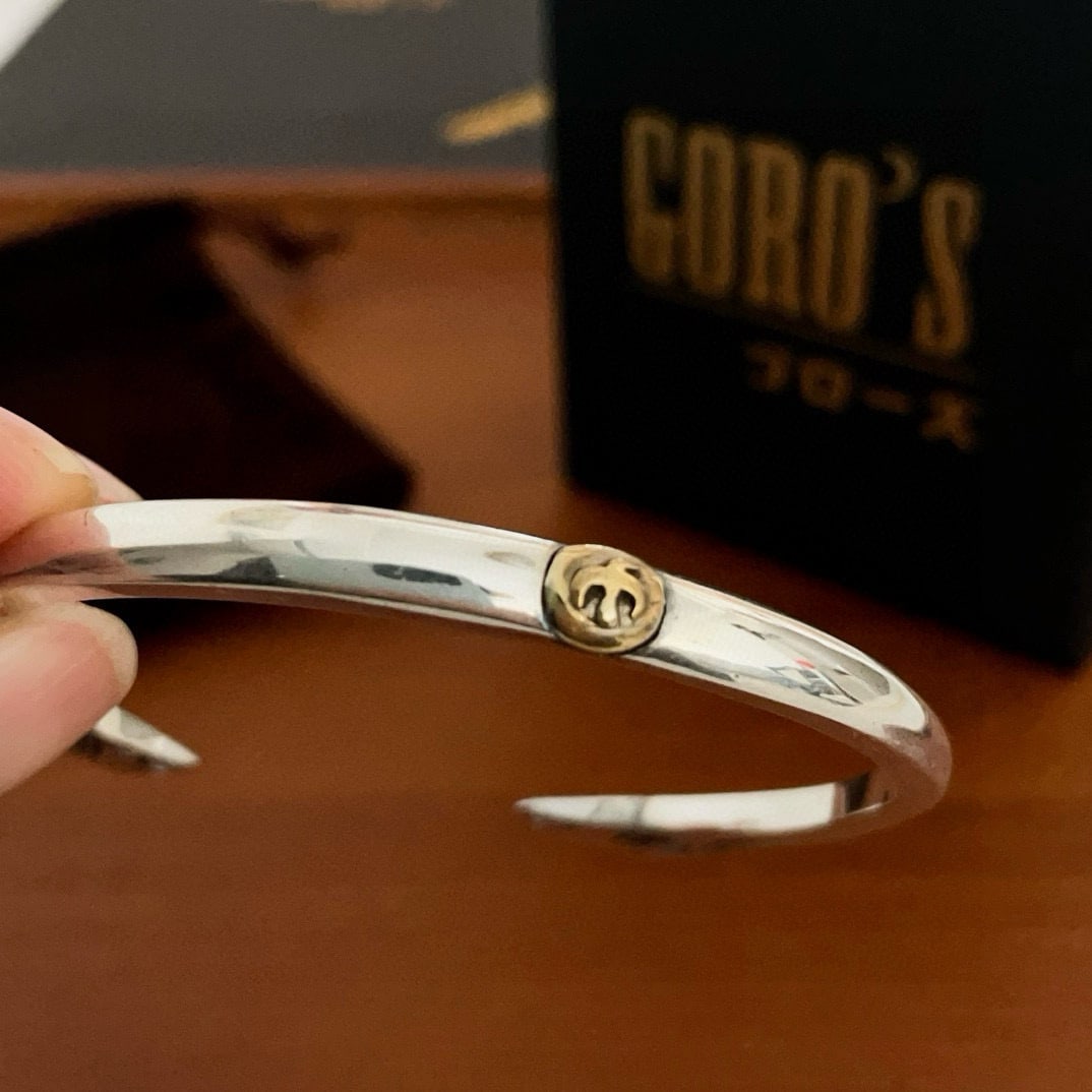 Goro's Gold Plated Open Bracelet: Goro's gold plated open bangle is a trendy and fashionable must have. Suitable for both men and women, it's a matching couple's style with a rock punk Thai silver retro element. It's versatile and tre