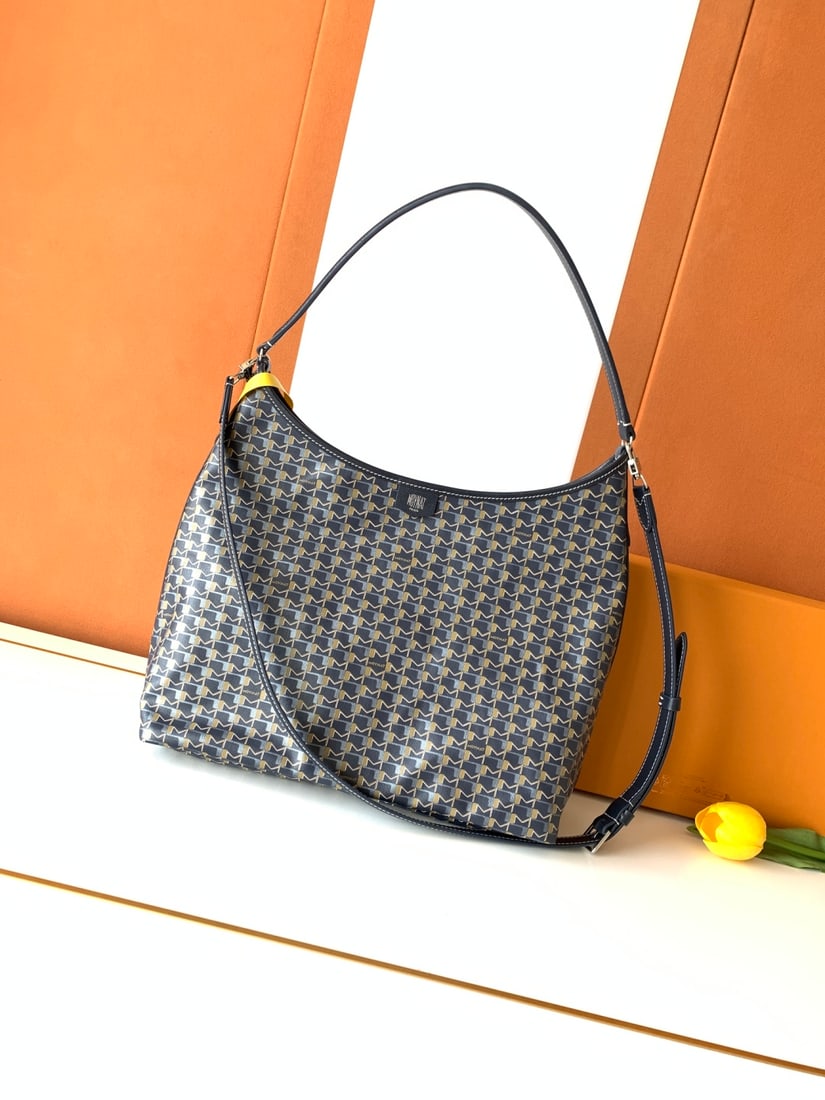 Moynat Hobo Bag: The Moynat Hobo Bag features a zipper, a long shoulder strap, a lightweight design, and a large capacity. This bag offers both a sense of security and a versatile, casual style. Dimensions: 32 x 27 x 