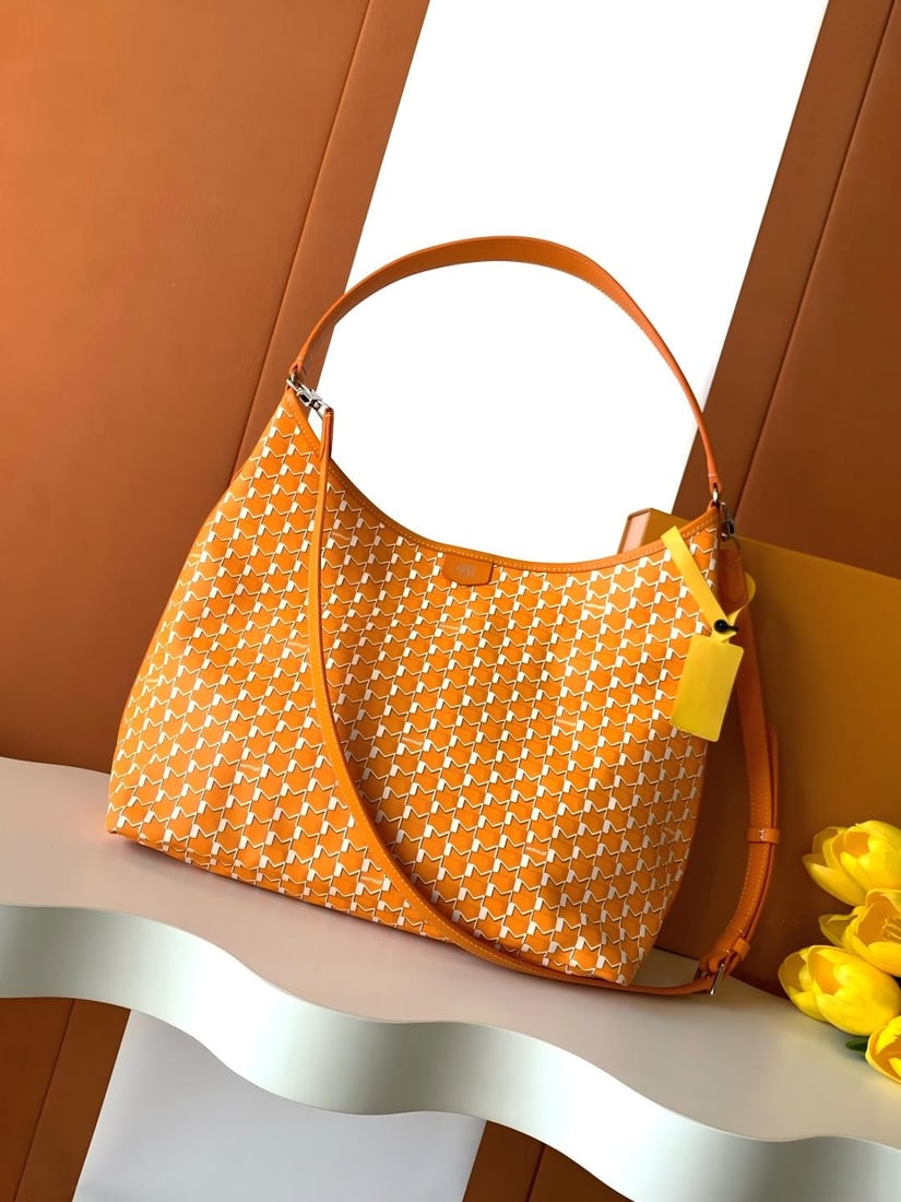 Moynat Hobo Bag: The Moynat Hobo Bag features a zipper, a long shoulder strap, a lightweight design, and a large capacity. This bag offers both a sense of security and a versatile, casual style. Dimensions: 32 x 27 x 