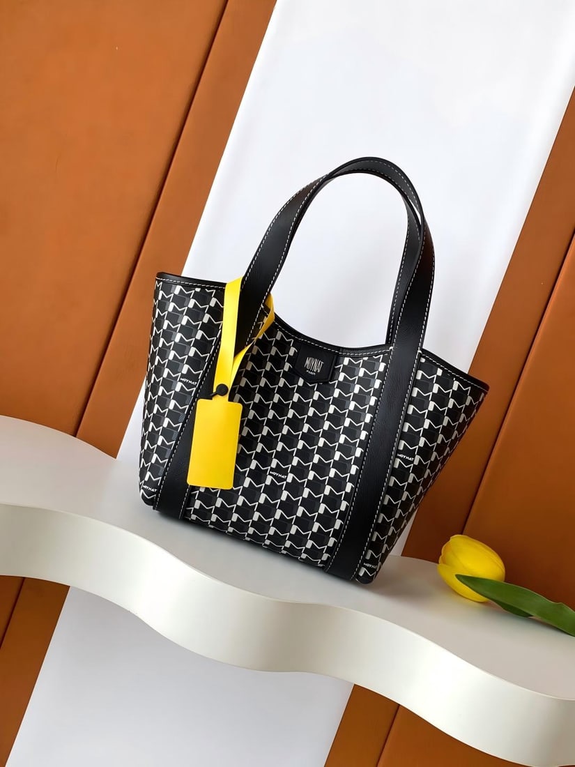 Moynat Duo Tote BB Tote Bag: The Duo Tote BB tote bag is lightweight and portable. MOYNAT showcases exquisite details through superior leather craftsmanship, creating a modern and timeless piece. This two-tone leather tote bag fe